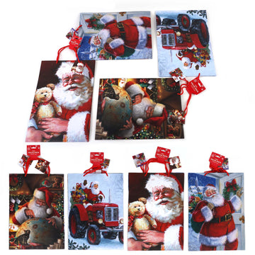 2Pk Extra Large Santa Is On  The Way Printed Bag, 4 Designs
